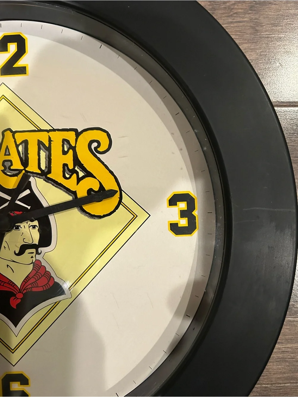 Bulova Pirates Wall Clock - Black and Yellow with Red Accent